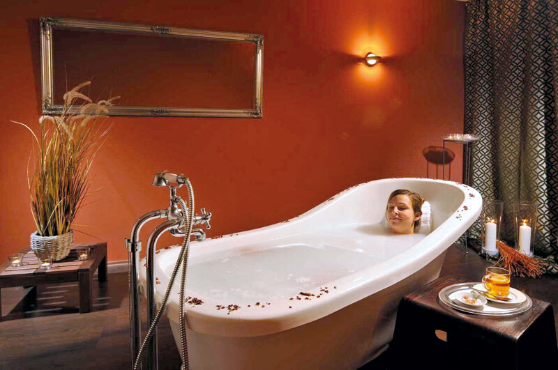Frau in Badewanne