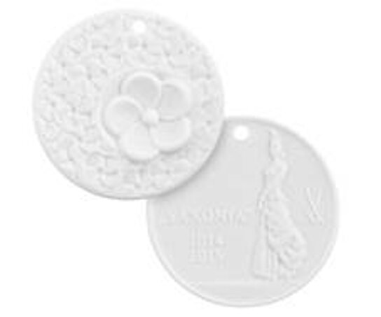 Medaille aus Porzellan