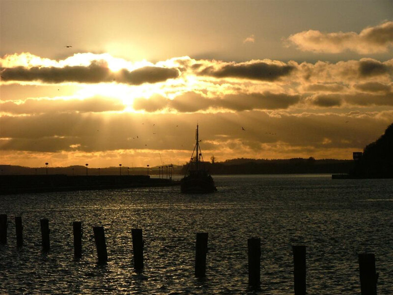 Sonnenuntergang über dem Hafen