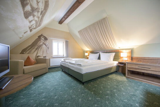 Doppelzimmer mit Dachschräge