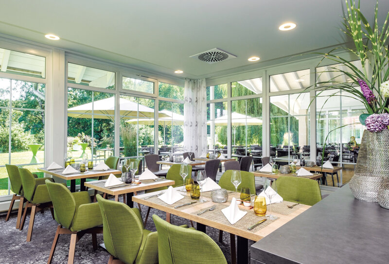 Restaurant in Grün gestaltet